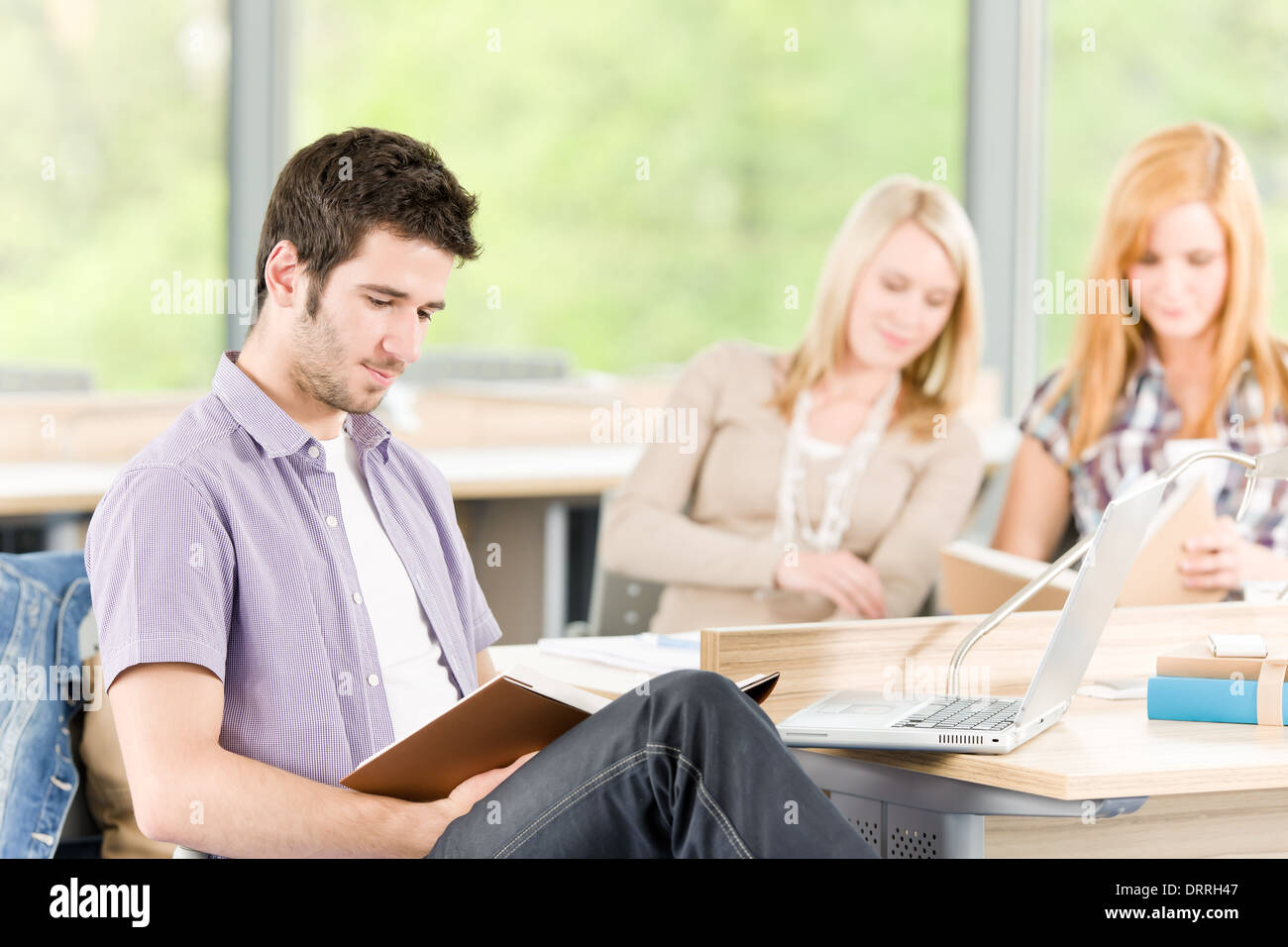 Group of young high school students learning Stock Photo - Alamy