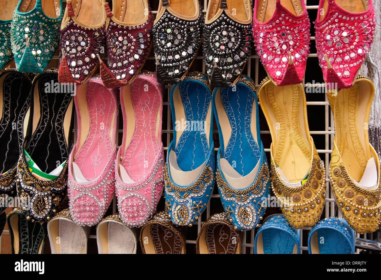 Women's shoes for sale in textile souk, Bastakia Quarter, Old Dubai, United Arab Emirates Stock Photo