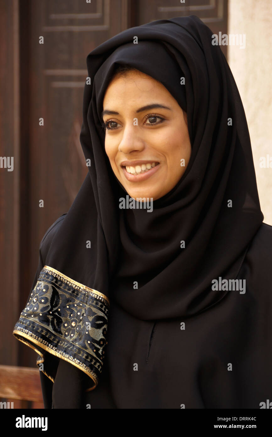 Beautiful Muslim woman with head covered, Dubai, United Arab Emirates Stock Photo