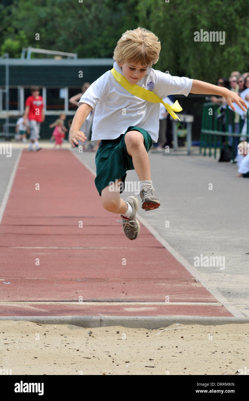 A child tries out long jump Stock Photo Alamy