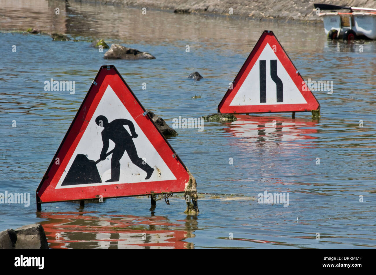 Sign on flooded road Stock Photo