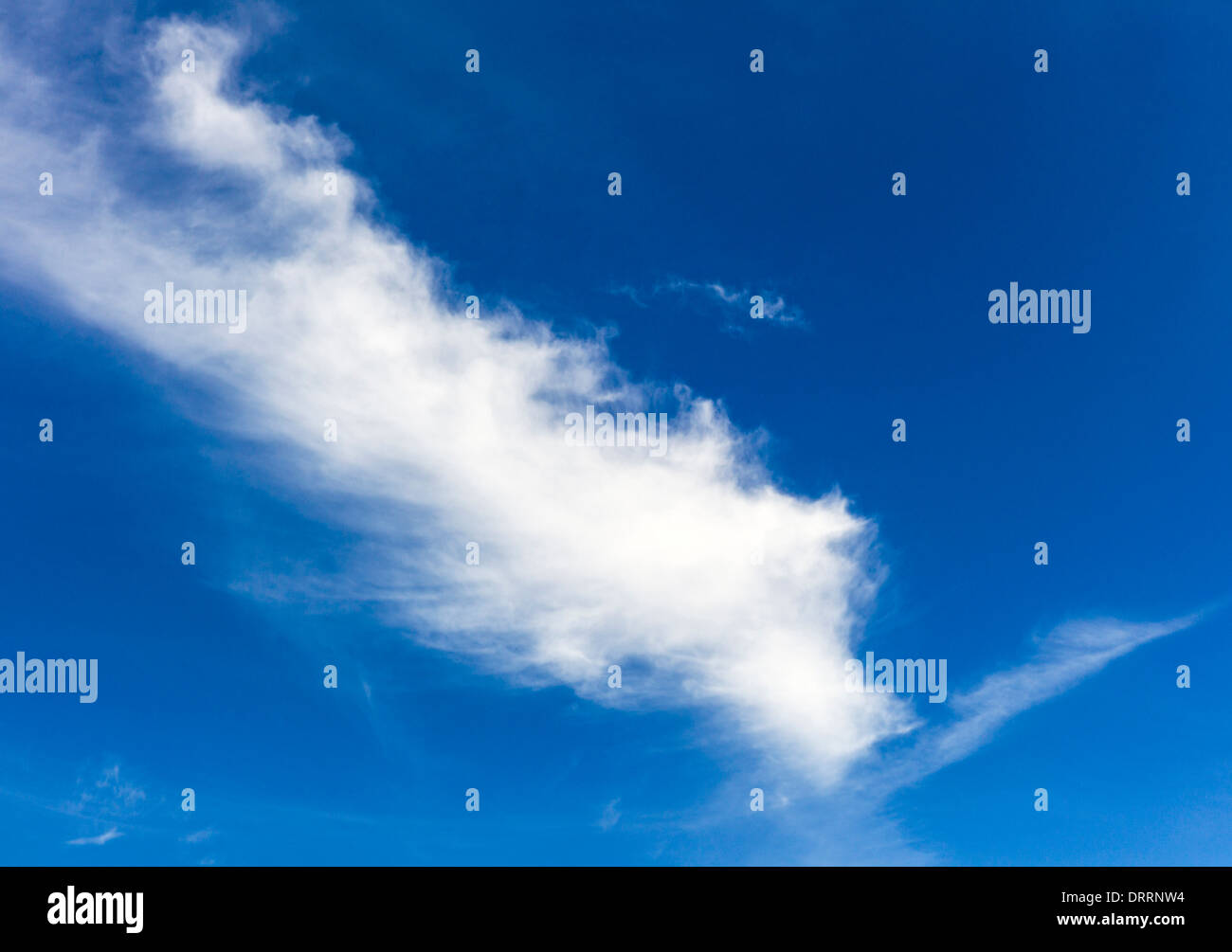Unusual white clouds against a clear blue Colorado sky Stock Photo