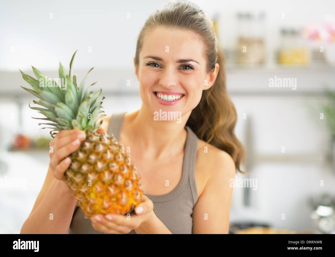 Woman with pineapple hires stock photography and images Alamy