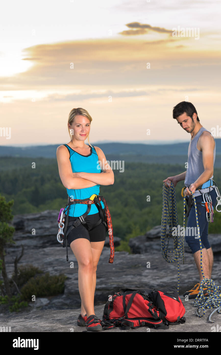 Rock climbing active people on top sunset Stock Photo Alamy