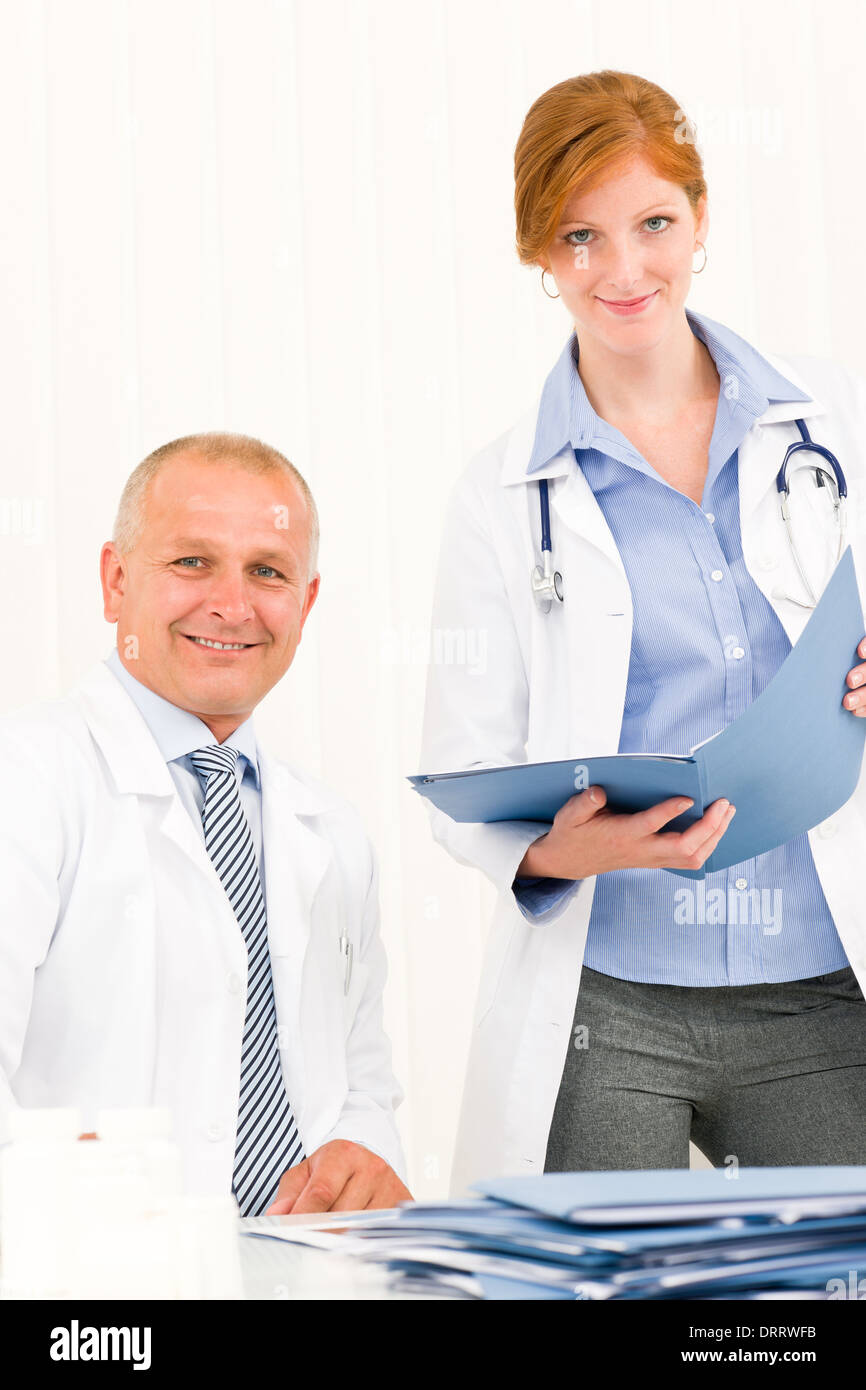 Medical doctor team senior male young woman Stock Photo