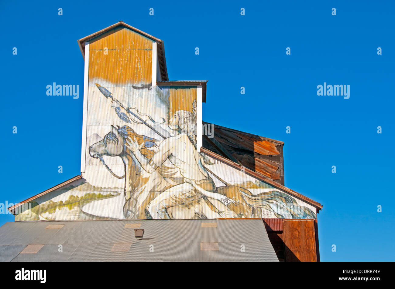 Old building mural on the Greybull (Wyoming) Elevator and Feed Store Stock Photo