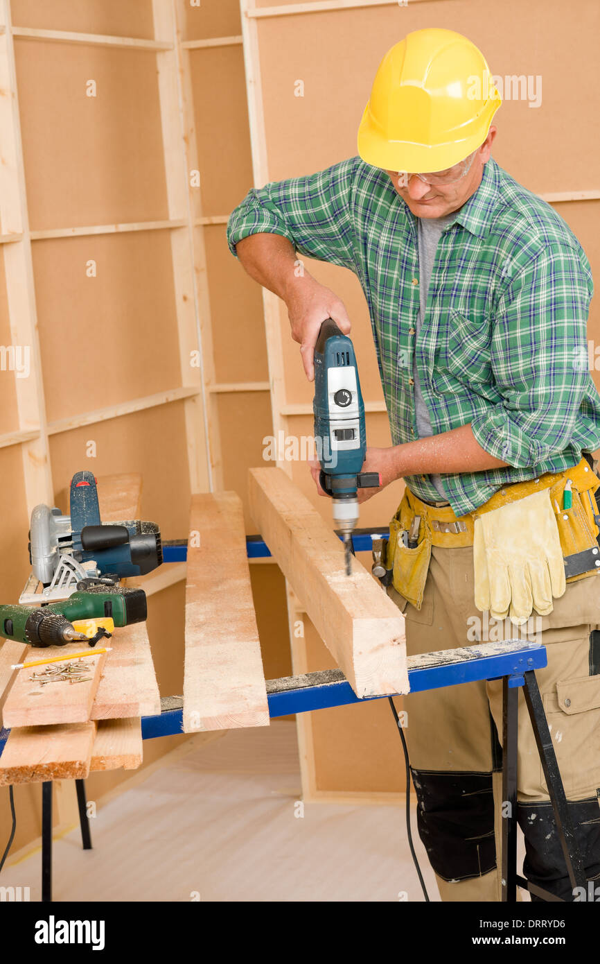 Handyman home improvement drilling wood Stock Photo