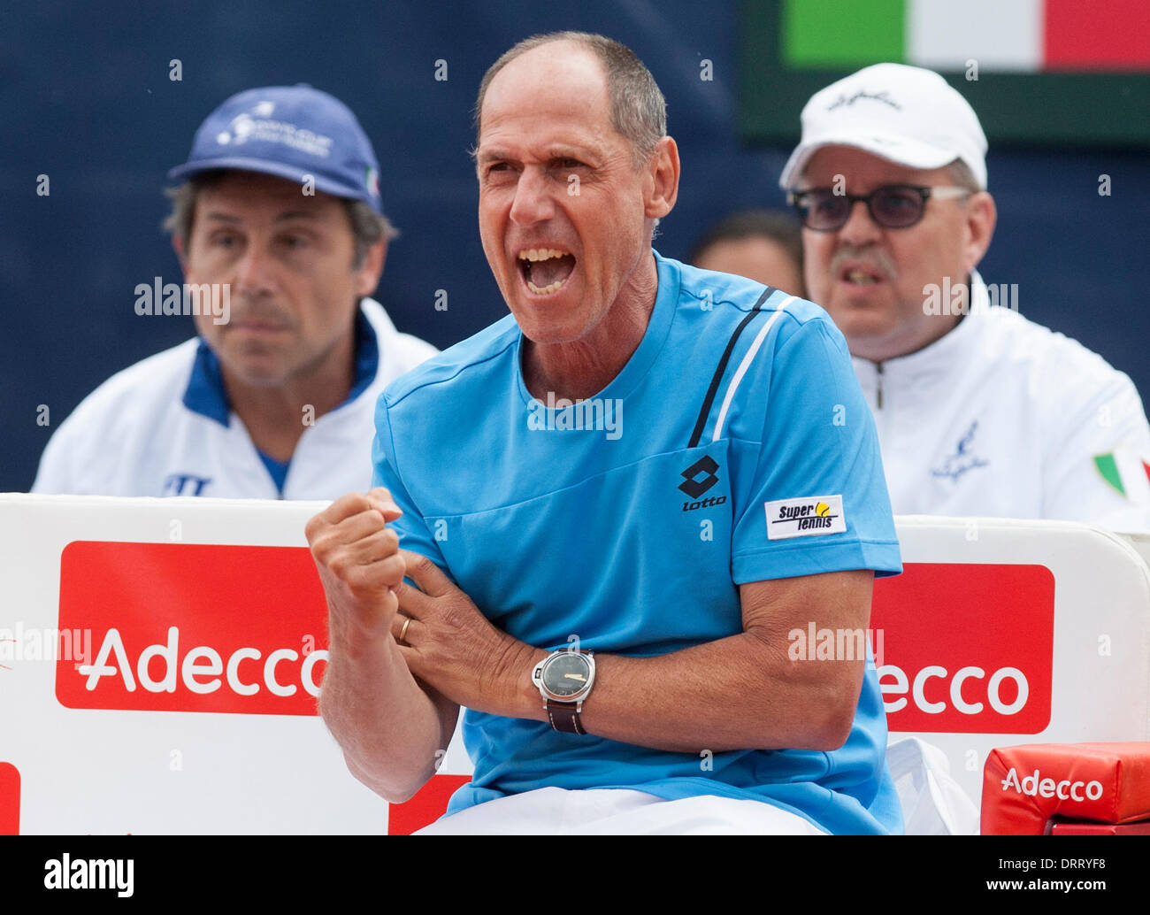 Mar Del Plata, Argentina. 31st Jan, 2014. Italy's team captain Corrado Barazzutti (C) reacts during the singles match between Argentina's Juan Monaco and Italy's Fabio Fognini at Davis Cup World Group 2014 1st Round at Patinodromo Municipal Adalberto Lugea of Mar del Plata City, 404 km from Buenos Aires city, capital of Argentina, on Jan. 31, 2014. Fognini defeated Monaco 3-0. Credit:  Martin Zabala/Xinhua/Alamy Live News Stock Photo