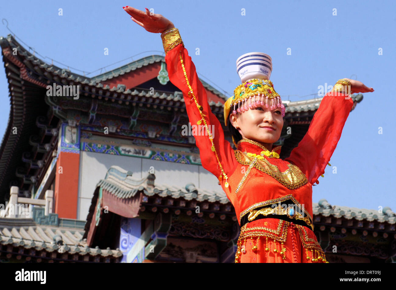 Lanzhou, China's Gansu Province. 1st Feb, 2014. An actress performs during the opening ceremony of a temple fair to celebrate the Spring Festival, or the Chinese Lunar New Year, in Lanzhou, capital of northwest China's Gansu Province, Feb. 1, 2014. The 14-day temple fair kicked off on Saturday, the second day of the seven-day break for Spring Festival. Credit:  Guo Gang/Xinhua/Alamy Live News Stock Photo