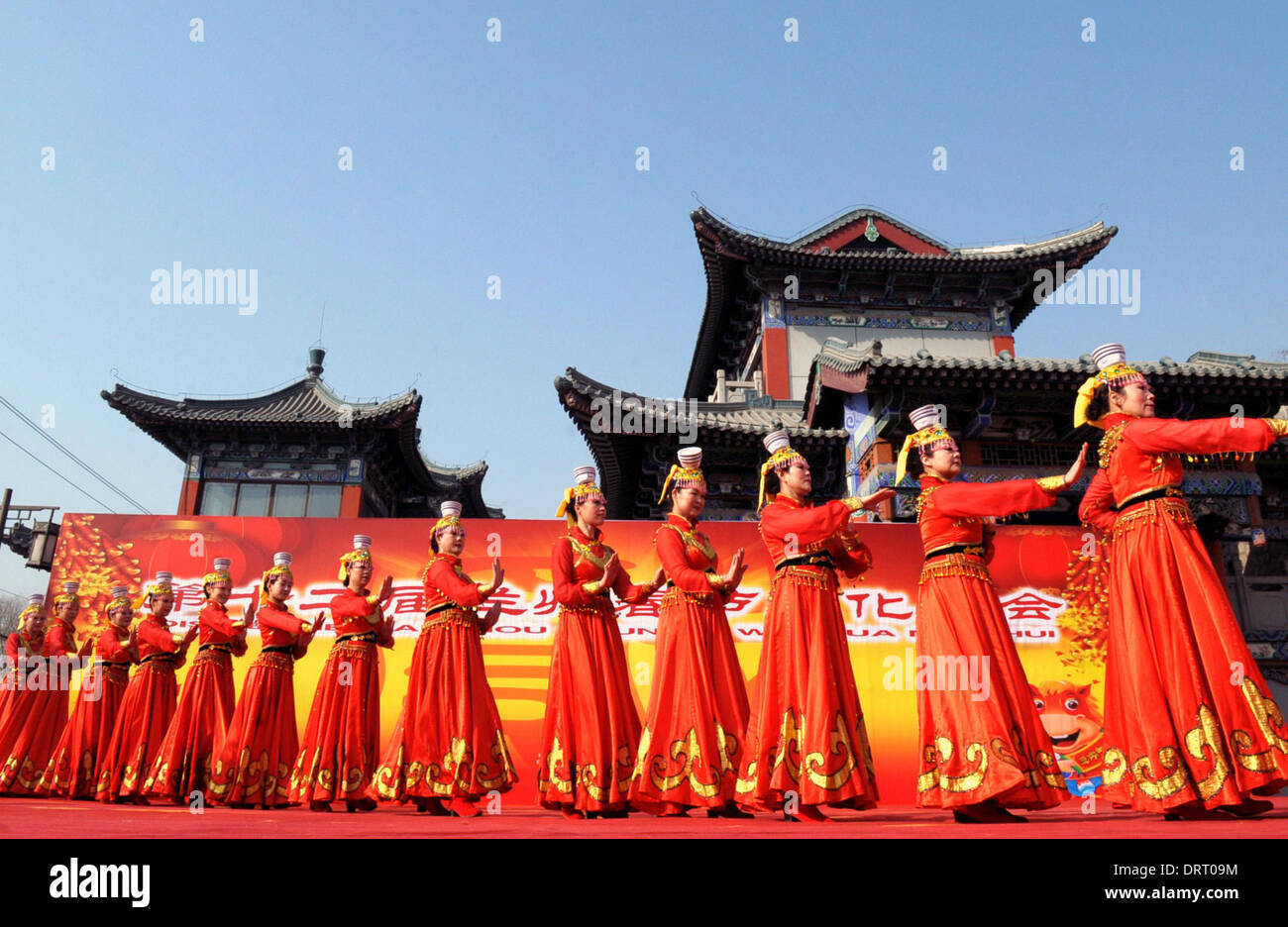 Lanzhou, China's Gansu Province. 1st Feb, 2014. Actresses perform during the opening ceremony of a temple fair to celebrate the Spring Festival, or the Chinese Lunar New Year, in Lanzhou, capital of northwest China's Gansu Province, Feb. 1, 2014. The 14-day temple fair kicked off on Saturday, the second day of the seven-day break for Spring Festival. Credit:  Guo Gang/Xinhua/Alamy Live News Stock Photo
