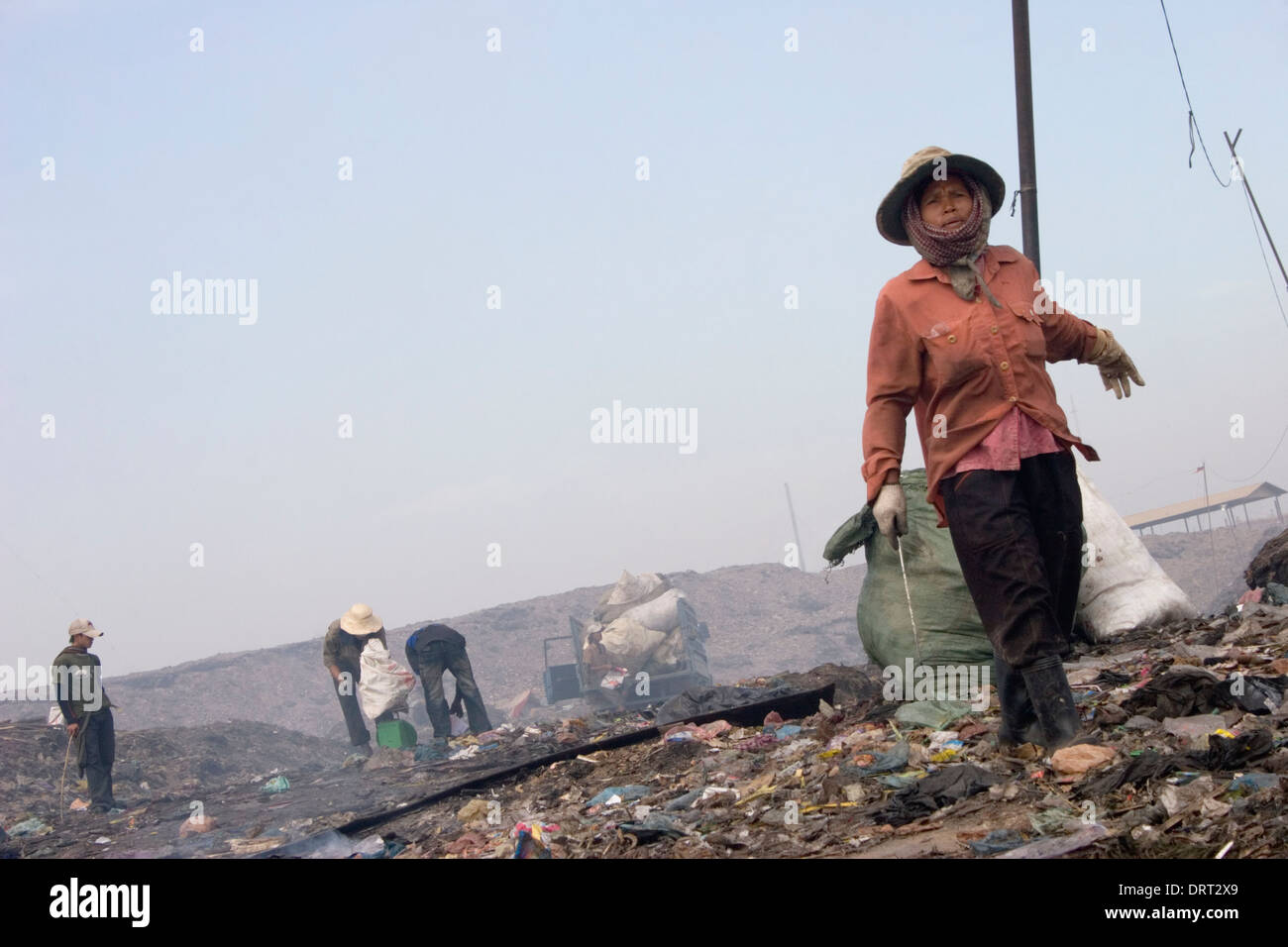 Plastic and rotting garbage provides the work environment at the toxic