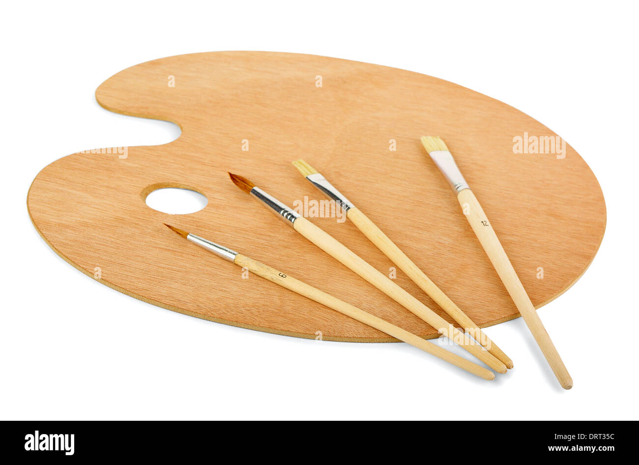 Artist palette and brushes on a white background Stock Photo