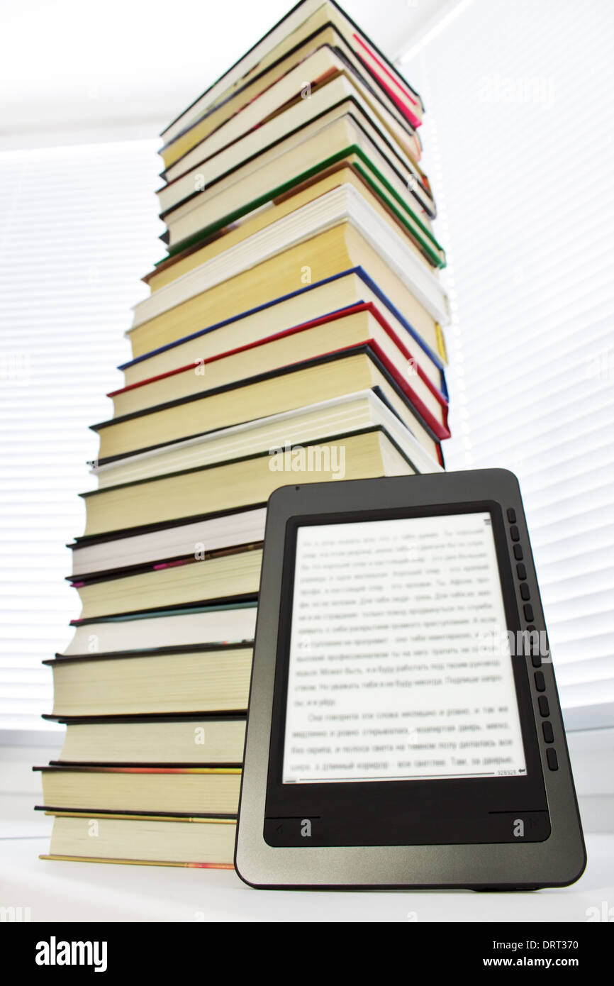 Ebook reader on a light background Stock Photo Alamy