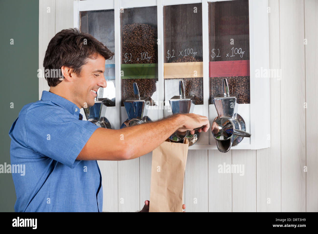 Man Buying Coffee From Vending Machine In Supermarket Stock Photo Alamy