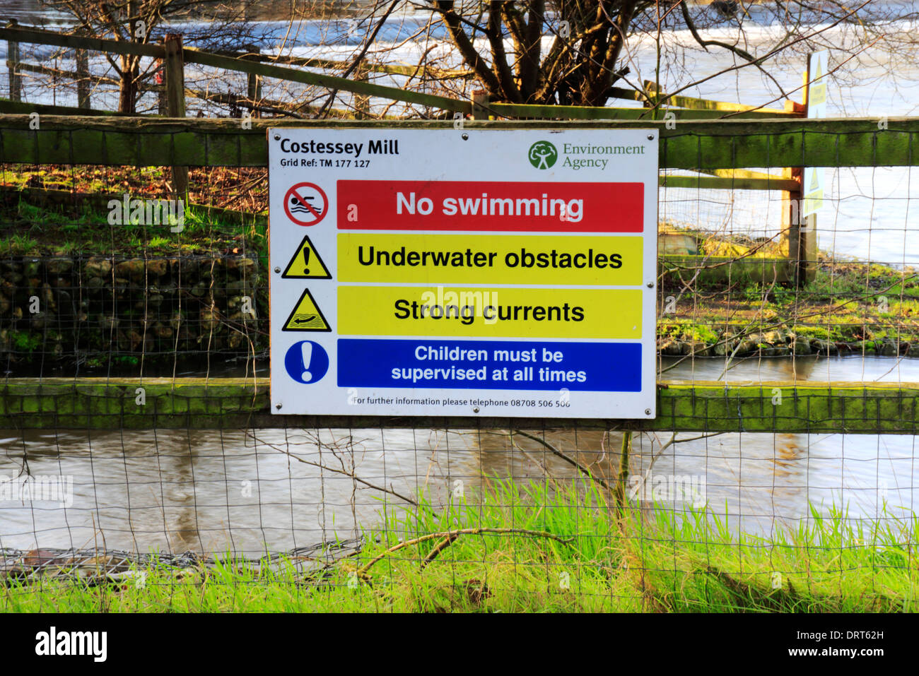 Environment Agency warning sign by the River Wensum at Costessey Mill Sluice, Norfolk, England, United Kingdom. Stock Photo