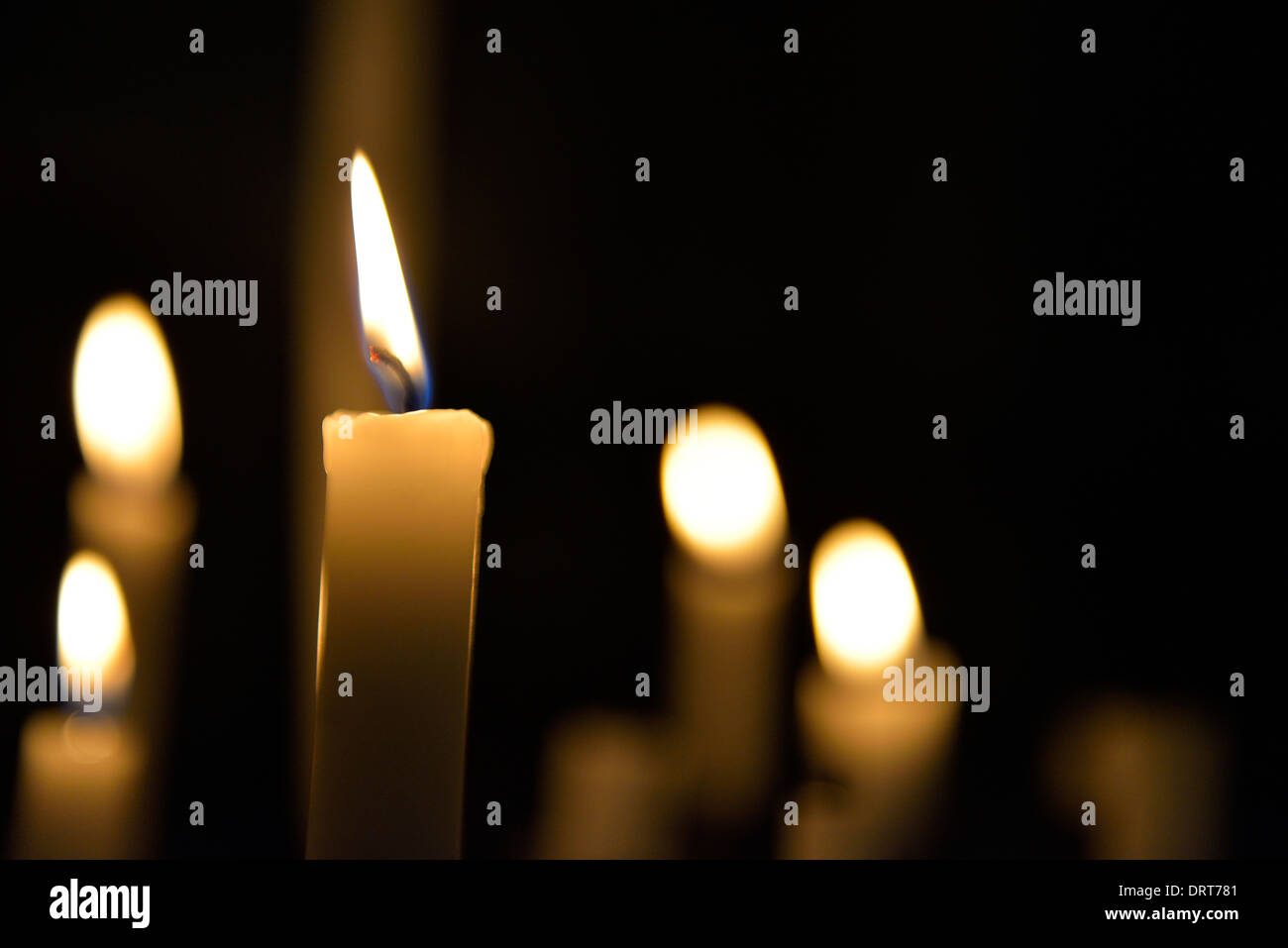 Candles flame over dark background Stock Photo