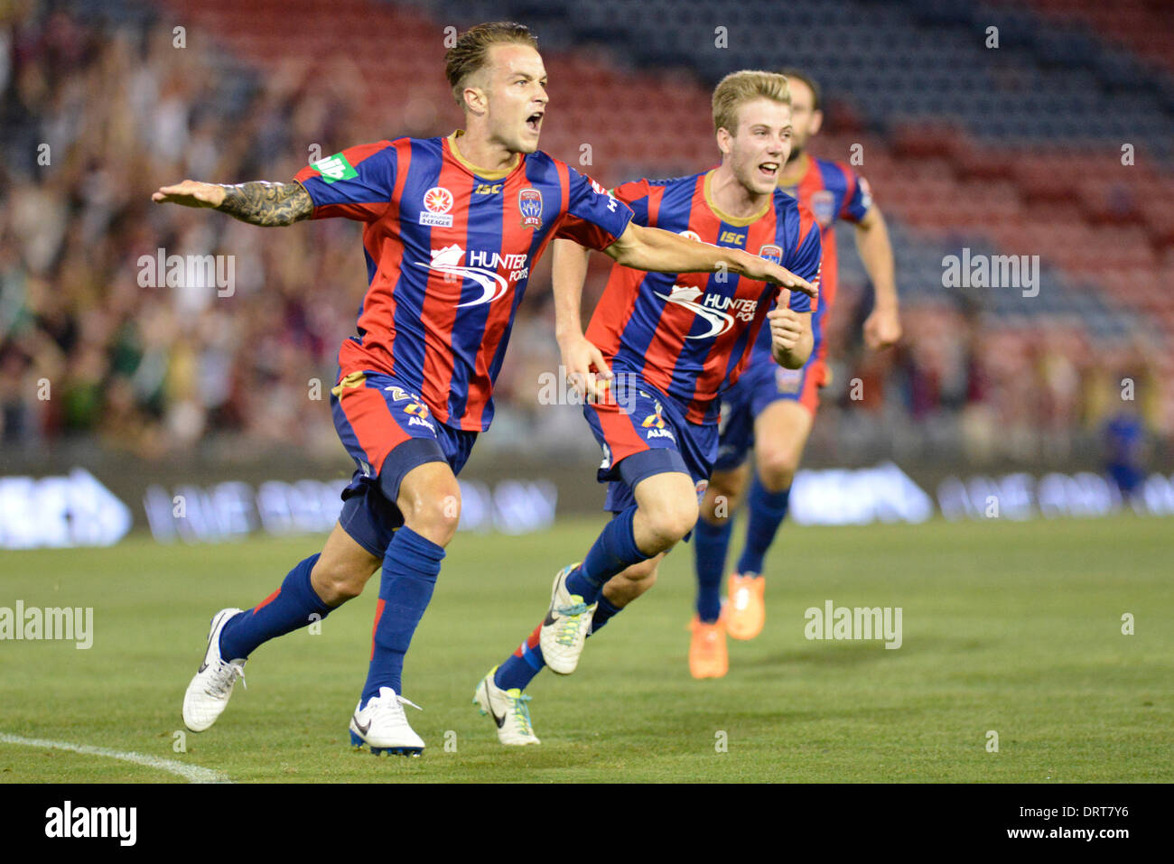 Sydney, Australia. 1st Feb, 2014. Jets forward Adam Taggart celebrates as he scores during the Hyundai A League game between the Newcastle Jets FC and Western Sydney Wanderers FC from the Hunter Stadium, Newcastle. The match ended in a 2-2 draw. Credit:  Action Plus Sports Images/Alamy Live News Stock Photo