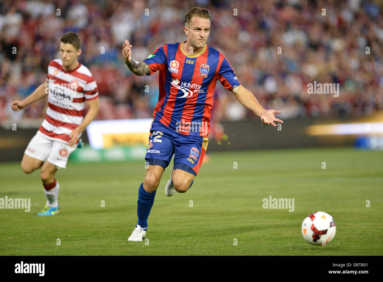 Sydney, Australia. 1st Feb, 2014. Jets forward Adam Taggart in action during the Hyundai A League game between the Newcastle Jets FC and Western Sydney Wanderers FC from the Hunter Stadium, Newcastle. The match ended in a 2-2 draw. Credit:  Action Plus Sports Images/Alamy Live News Stock Photo