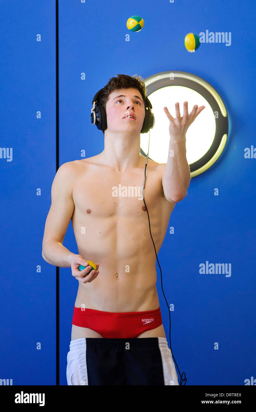 Southend-on-Sea, England. 1st Feb, 2014. Freddie Woodward of City of Sheffield Diving Club juggles to relax between dives during the Mens 3m Springboard Preliminary on Day 2 of the British Gas Diving National Cup 2014 from Southend Swimming and Diving Centre. Credit:  Action Plus Sports Images/Alamy Live News Stock Photo