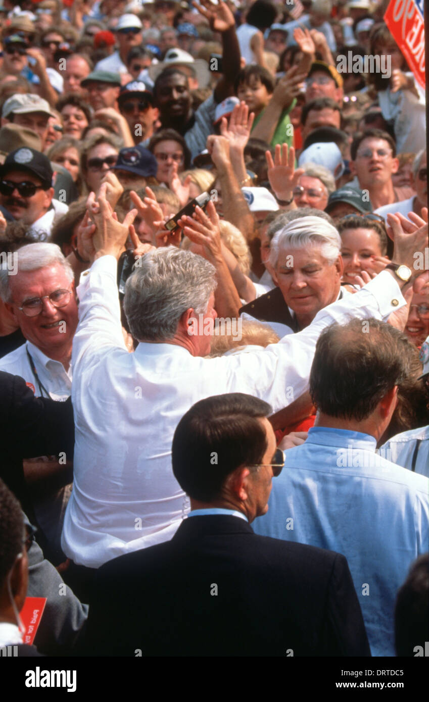 US President Bill Clinton greets supporters during a campaign stop on ...