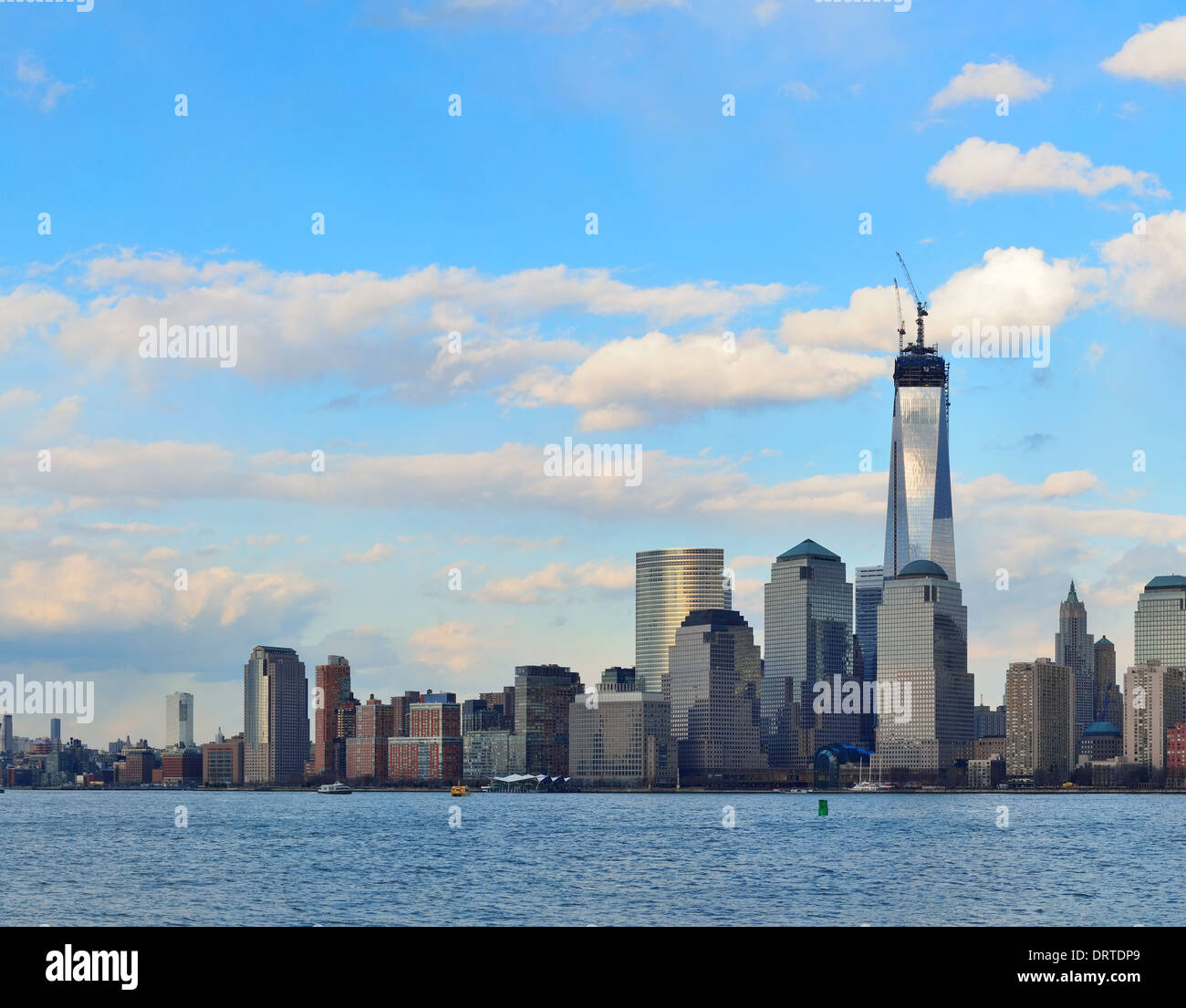 Downtown Manhattan skyline at sunset over Hudson River in New York City ...