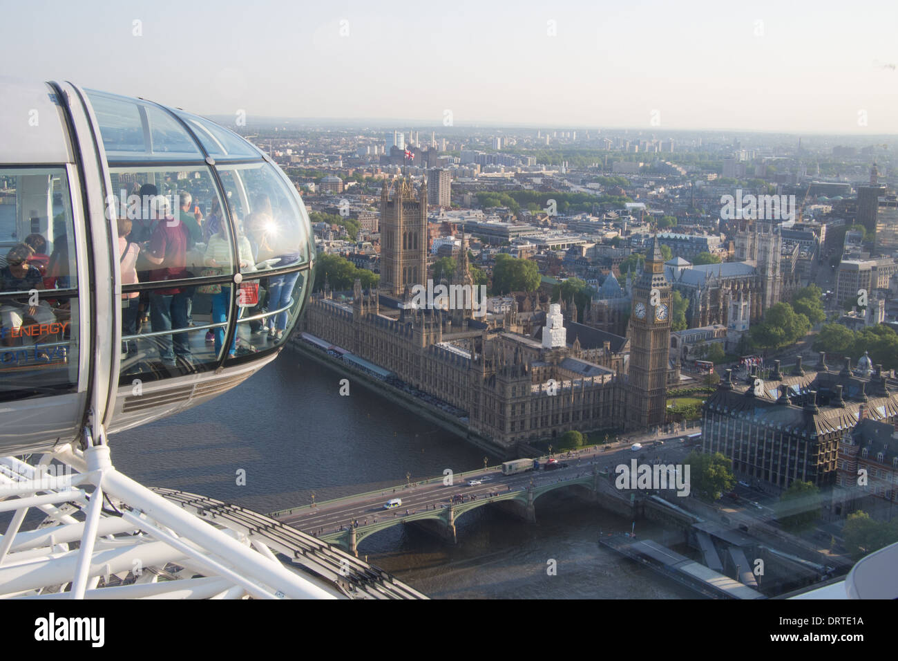 London Eye and The Houses of Parliament on the River Thames, London, England Stock Photo