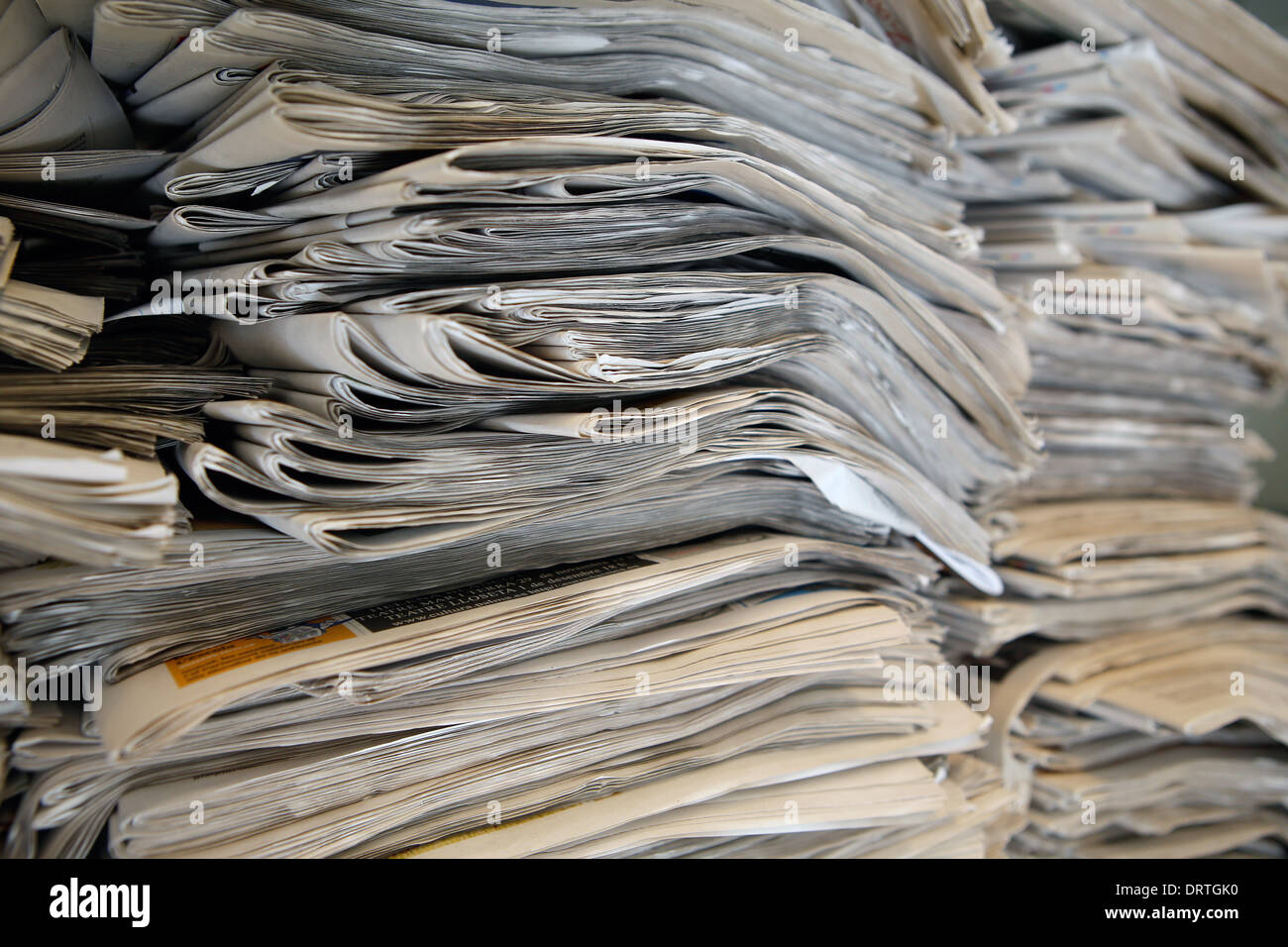 Newspapers stacked at a local paper in the island of Mallorca, Spain Stock Photo