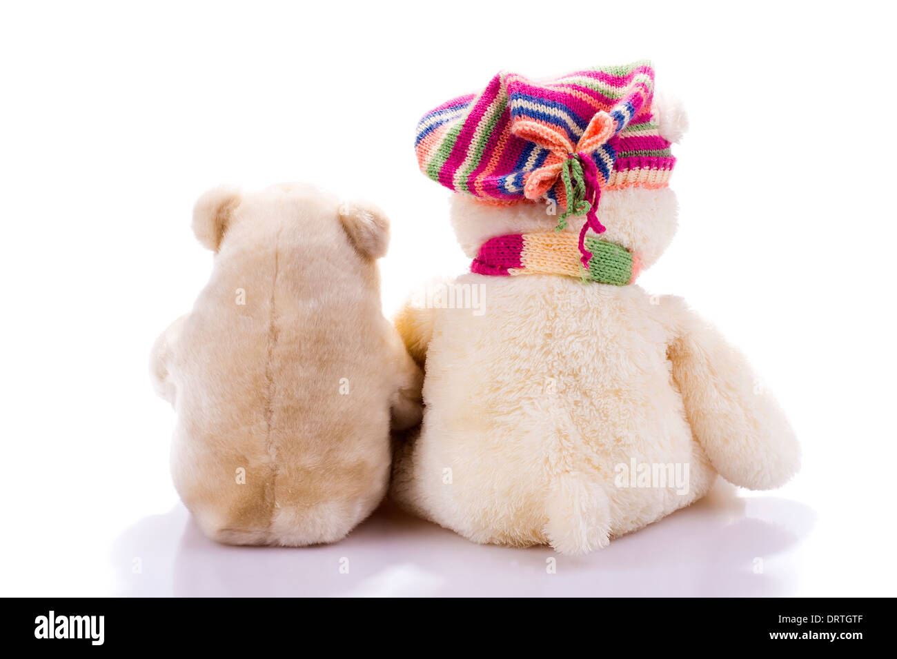 Couple of toy teddy bears from back isolated on white Stock Photo