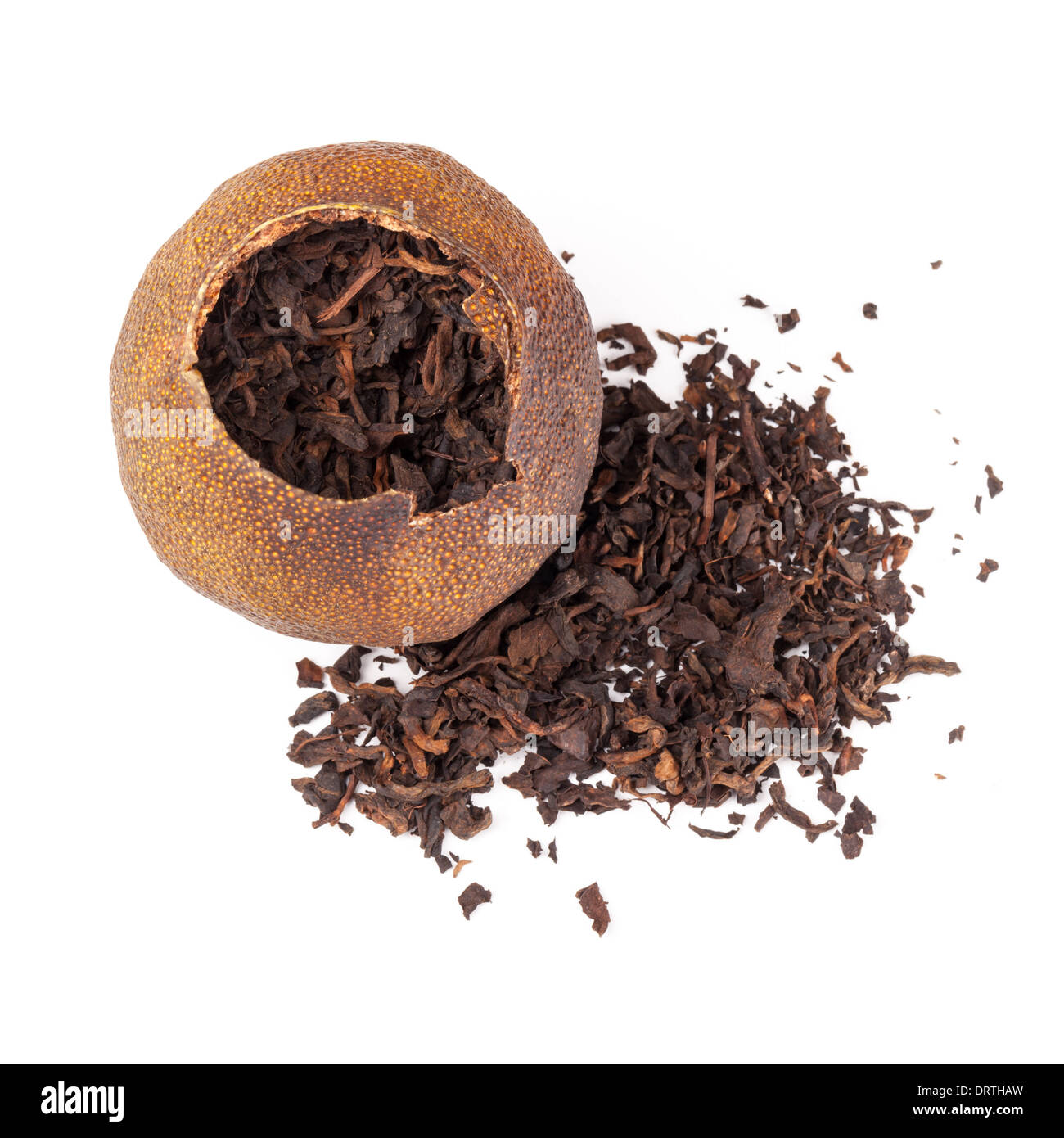 Chinese black tea Puerh packed in dried mandarin peel isolated on