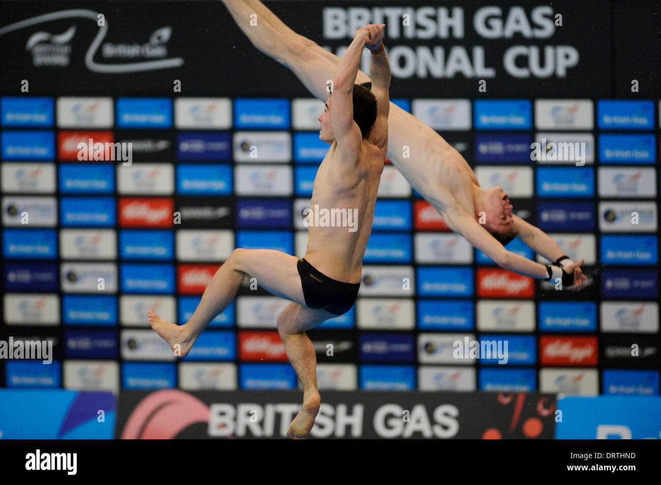 Southend-on-Sea, UK. 1st Feb, 2014. Daniel Goodfellow of Plymouth Diving gets out of shape in his dive before landing badly and injuring himself during a dive with Matty Lee of City of Leeds Diving Club in the Mens Synchronised 10m Platform Final on Day 2 of the British Gas Diving National Cup 2014 from Southend Swimming & Diving Centre. Credit:  Action Plus Sports Images/Alamy Live News Stock Photo
