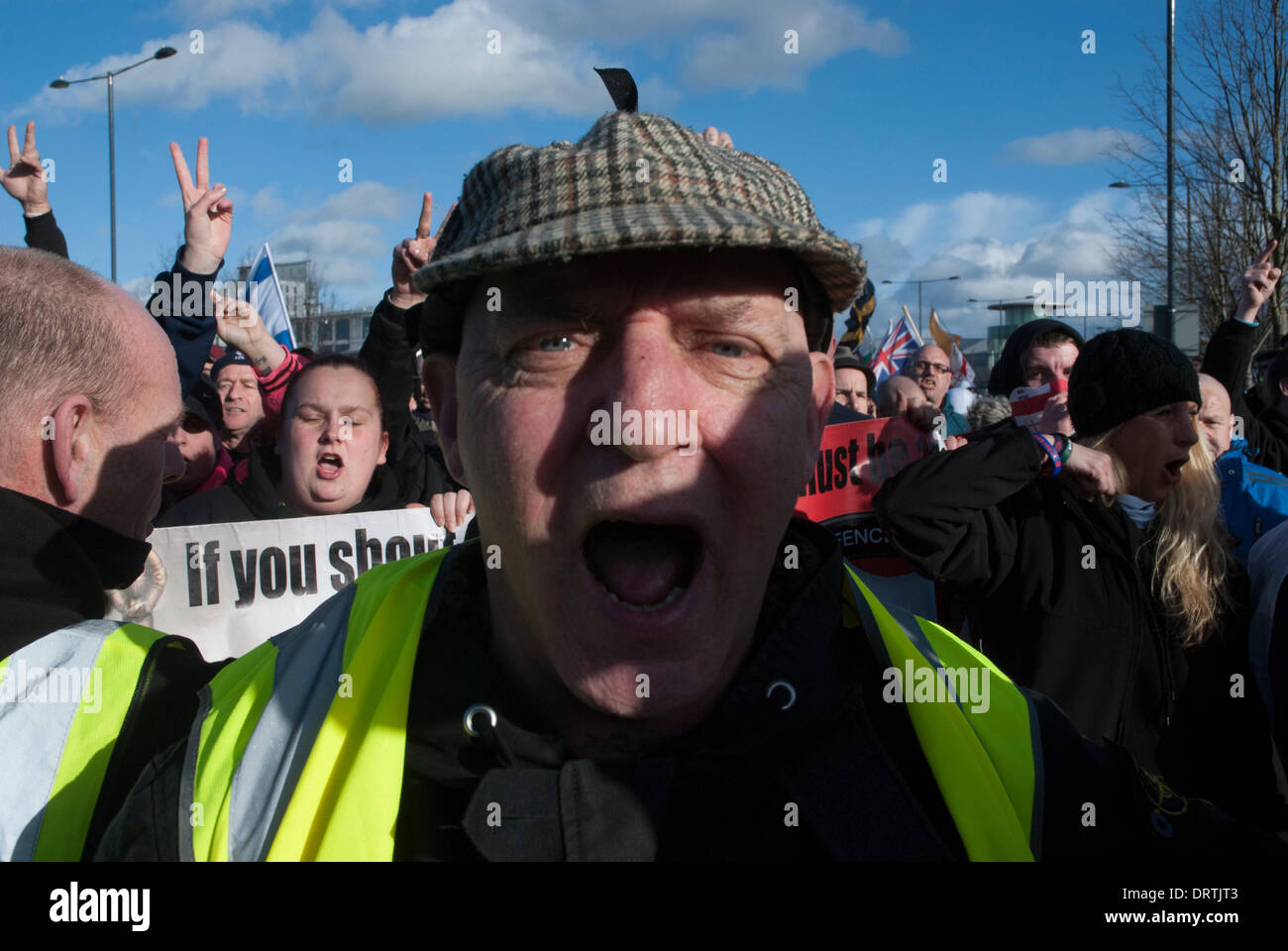 Slough, UK . 01st Feb, 2014. An English Defence League supporter marchers  with others in Slough town centre Credit:  Peter Manning/Alamy Live News Stock Photo