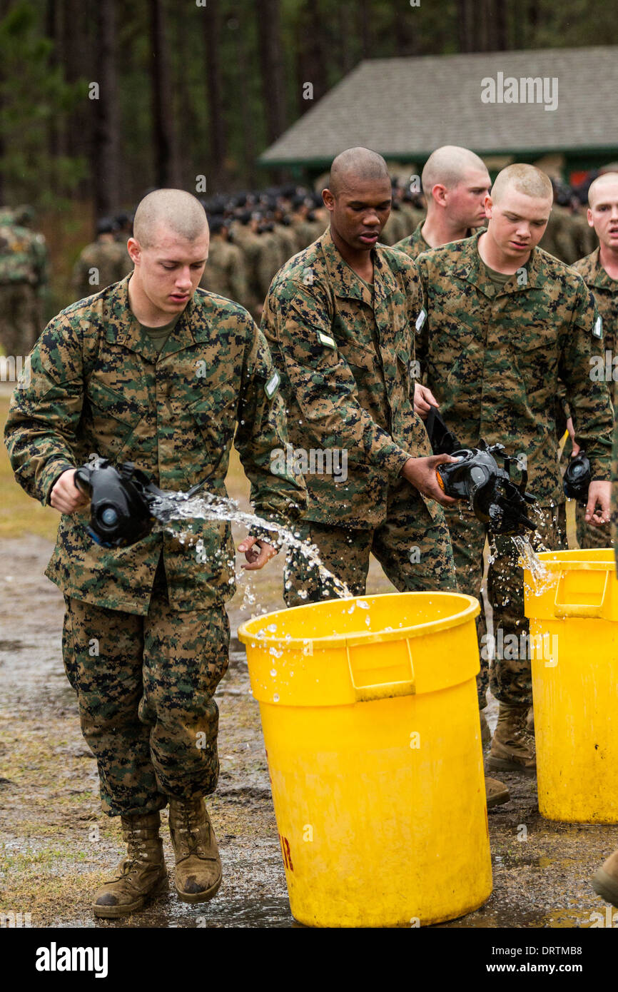 US Marine decontaminate their gas masks after exiting the gas chamber during boot camp January 13, 2014 in Parris Island, SC. Stock Photo