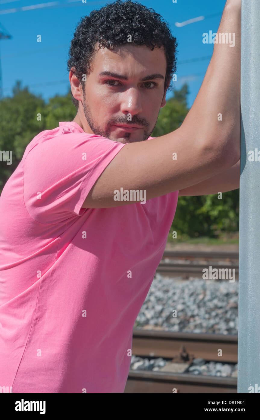 Man in pink t shirt hi-res stock photography and images - Alamy