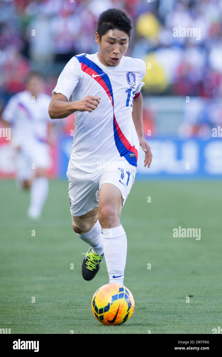 Carson, CA, USA. 1st Feb, 2014.  South Korea forward Lee Keun-Ho (11) moves the ball down the field in the first half during the game between USA and South Korea at the StubHub center in Carson, CA. Credit:  csm/Alamy Live News Stock Photo