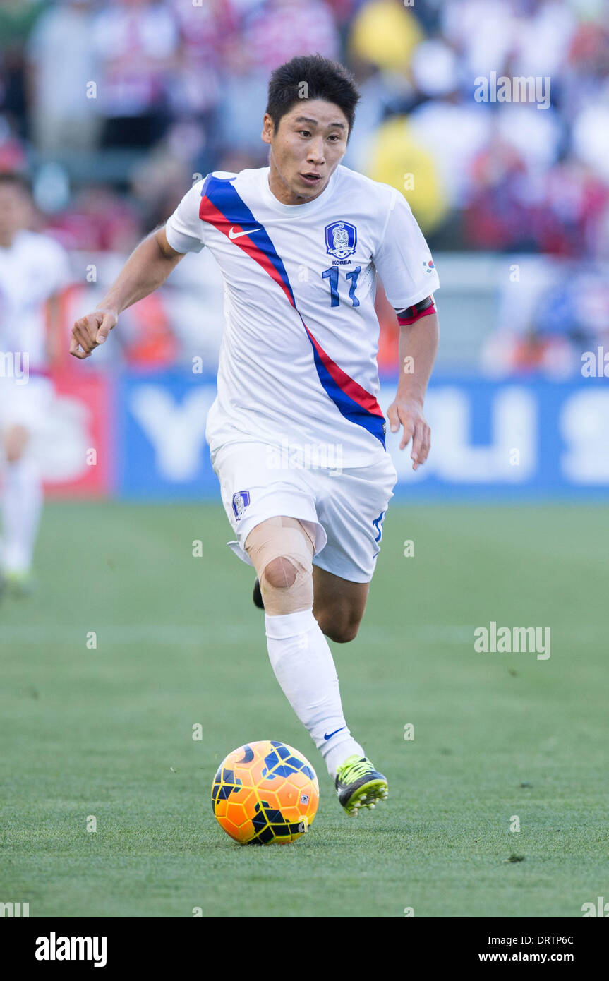 Carson, CA, USA. 1st Feb, 2014.  South Korea forward Lee Keun-Ho (11) moves the ball down the field in the first half during the game between USA and South Korea at the StubHub center in Carson, CA. Credit:  csm/Alamy Live News Stock Photo