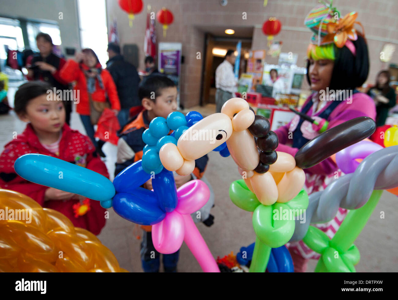 Toronto Canada. 1st Feb 2014. A balloon artist R makes the