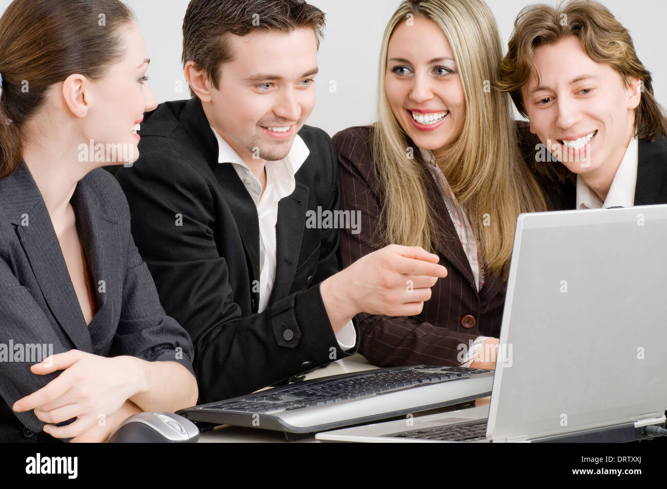 team of successful smiling young business people Stock Photo - Alamy