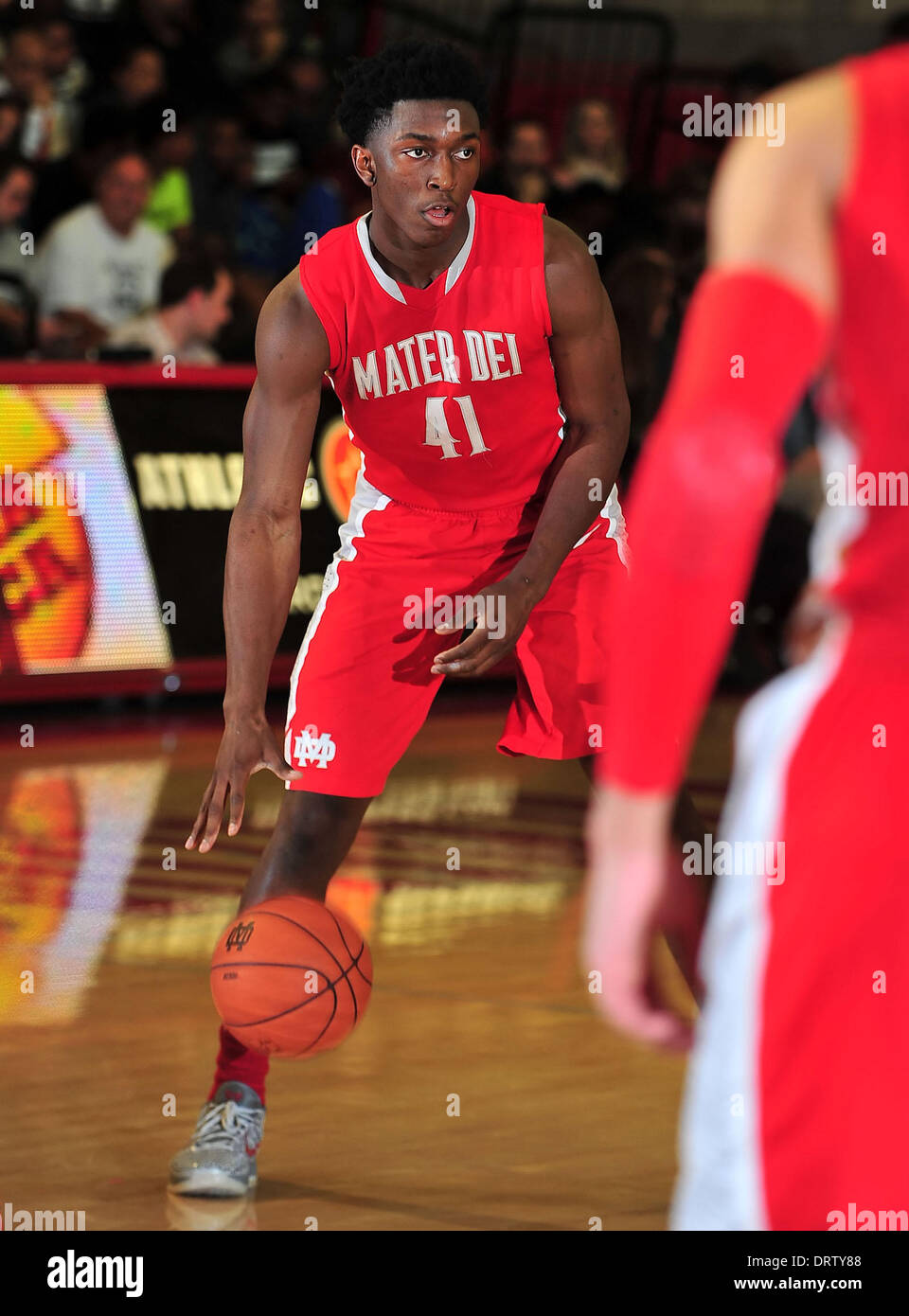 Santa Ana, CA, . 1st Feb, 2014. Stanley Johnson #41 of Mater Dei moves the  ball in action during the Nike Extravaganza Prep Basketball game Whitney  Young vs. Mater Dei at the