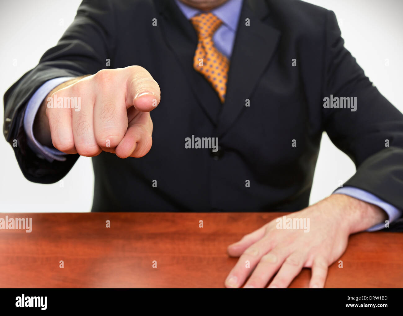 Businessman Pointing His Finger Directly at Camera. Stock Photo