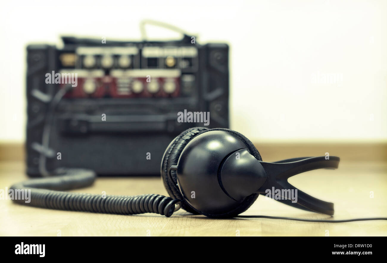 Headphones and guitar amplifier Stock Photo Alamy