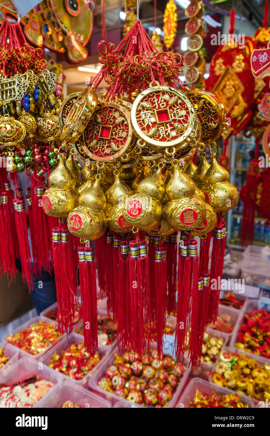 Festive decorations for sale in the Chinatown markets over the Luna New Year, Singapore Stock Photo