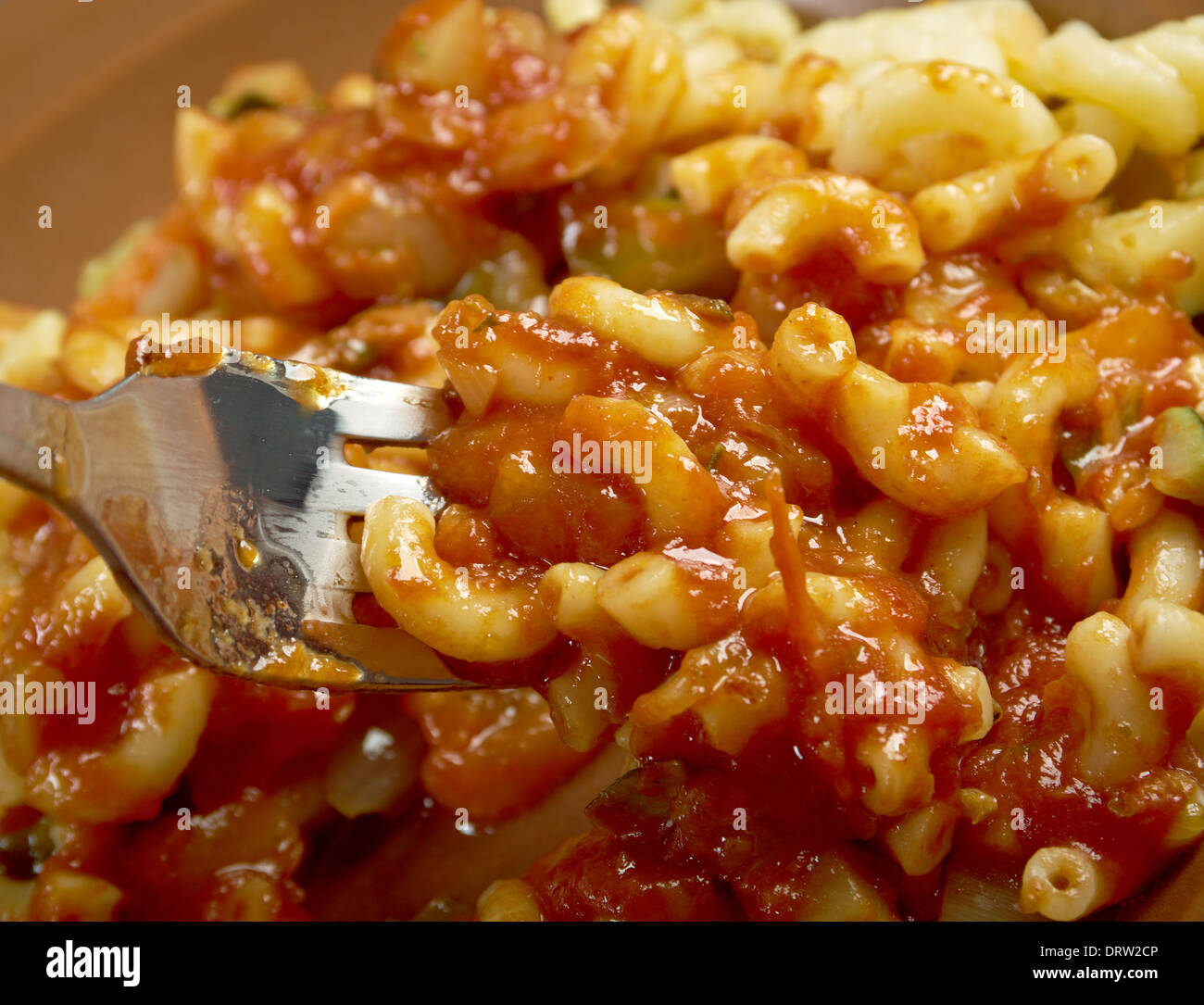 homemade elbow macaroni pasta with vegetable and tomato sauce Stock