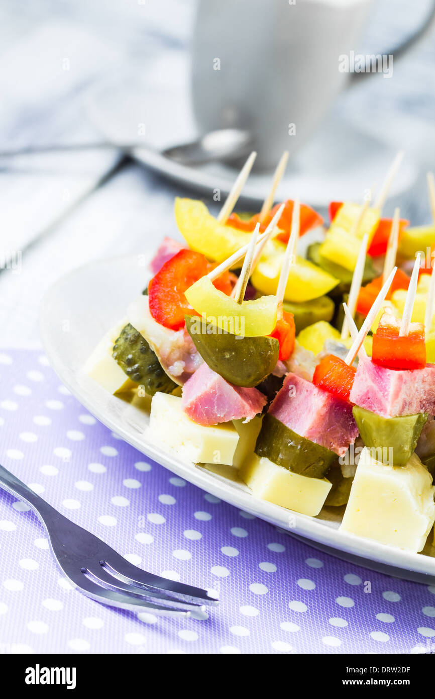 Finger foods on toothpicks as an appetizer Stock Photo - Alamy