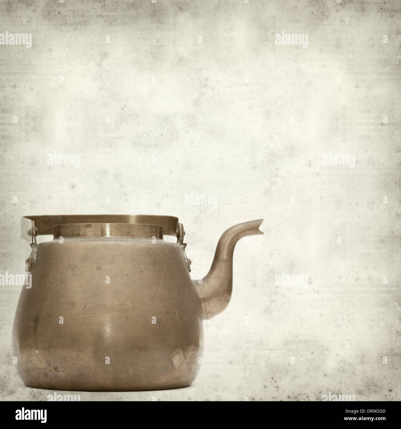 textured old paper background with vintage copper kettle Stock Photo