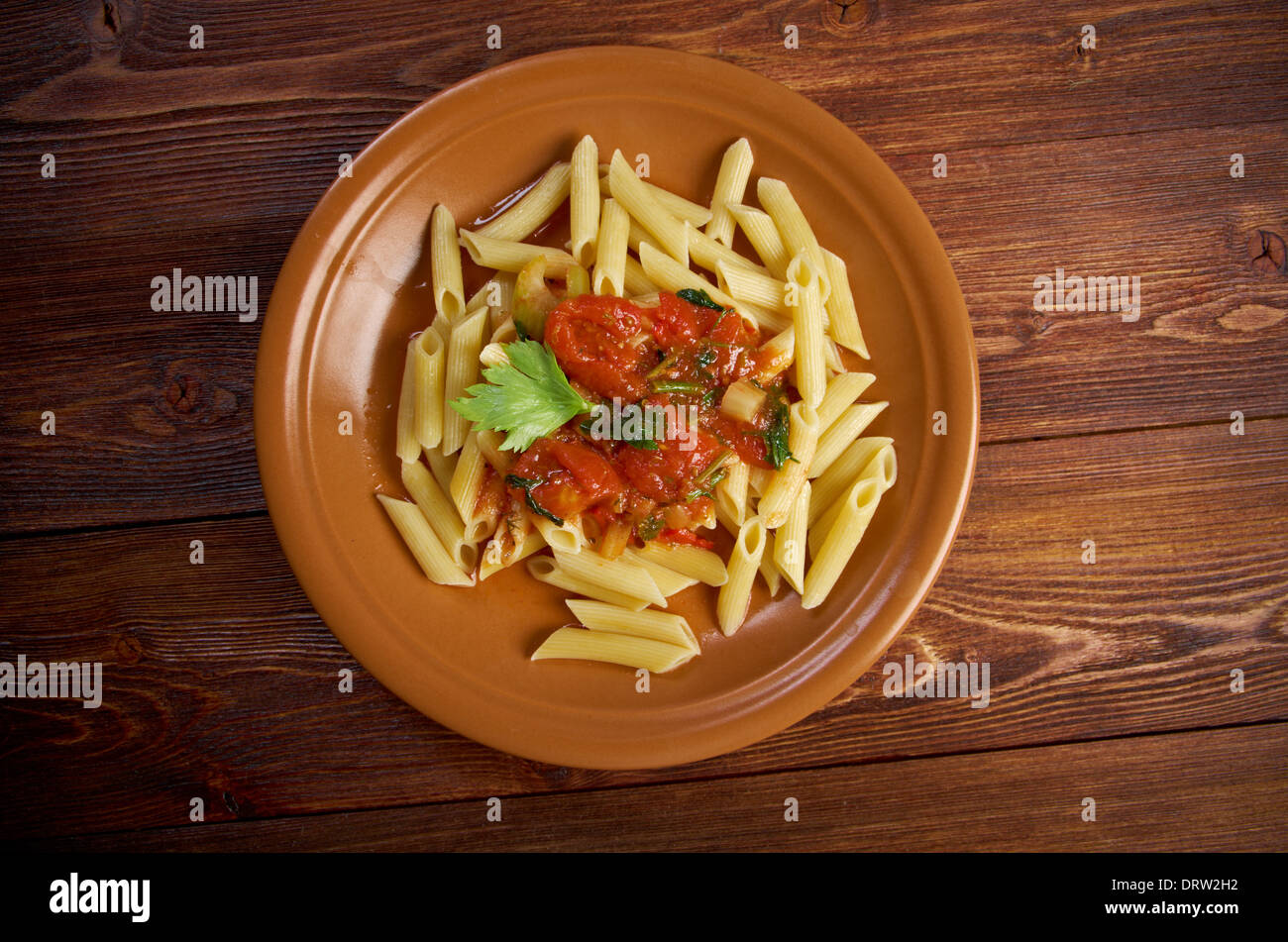 View of plate of penne rigata pasta with marinara sauce .farm-style Stock Photo ...