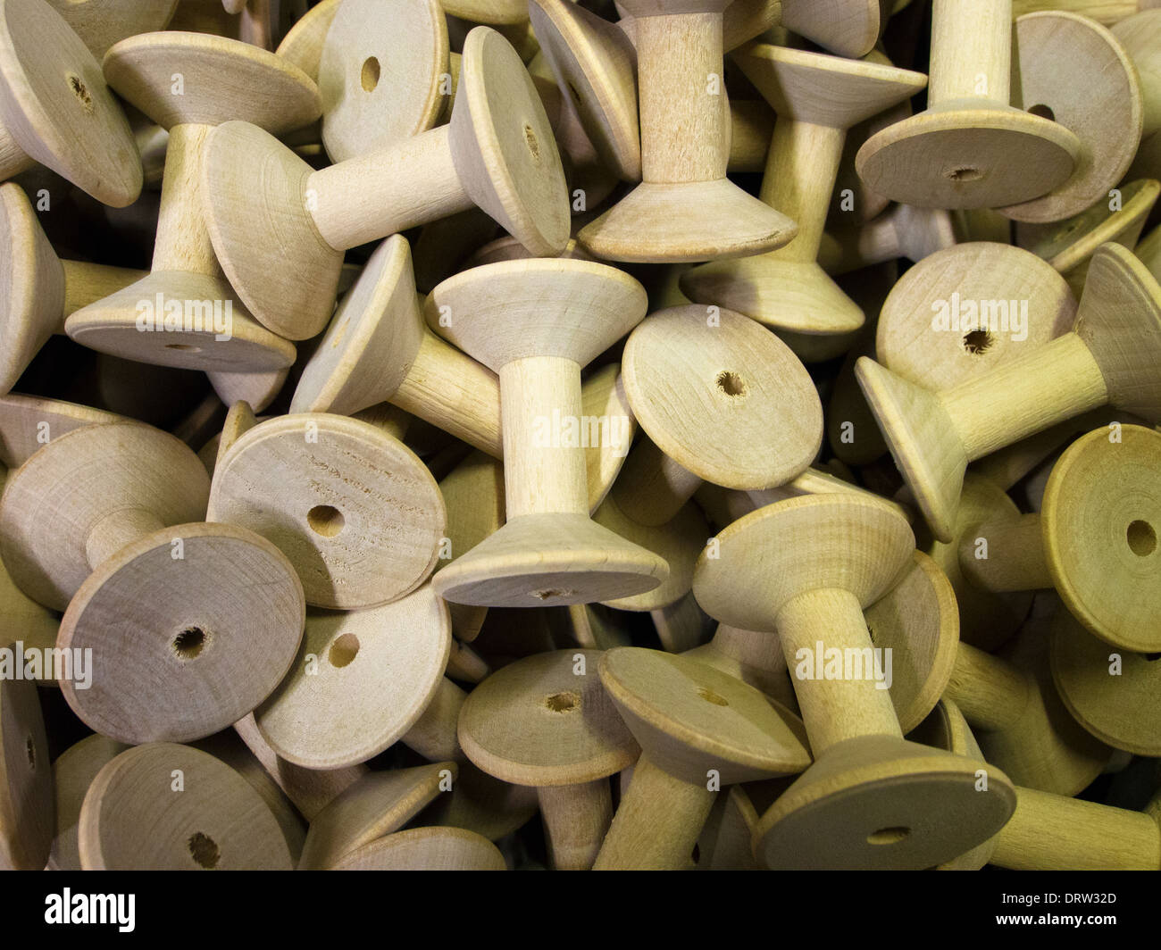 two old fashioned empty wooden cotton reels Stock Photo - Alamy