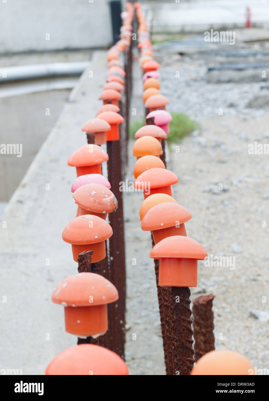 Iron bars on a work. The iron bars are part of the foundation of a