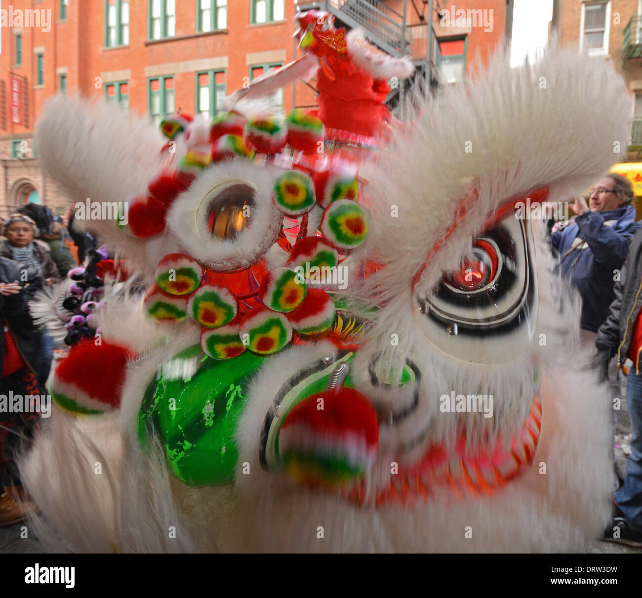 A dragon marching in the Chinese New Year parade on Mott Street in Chinatown, New York City. Stock Photo