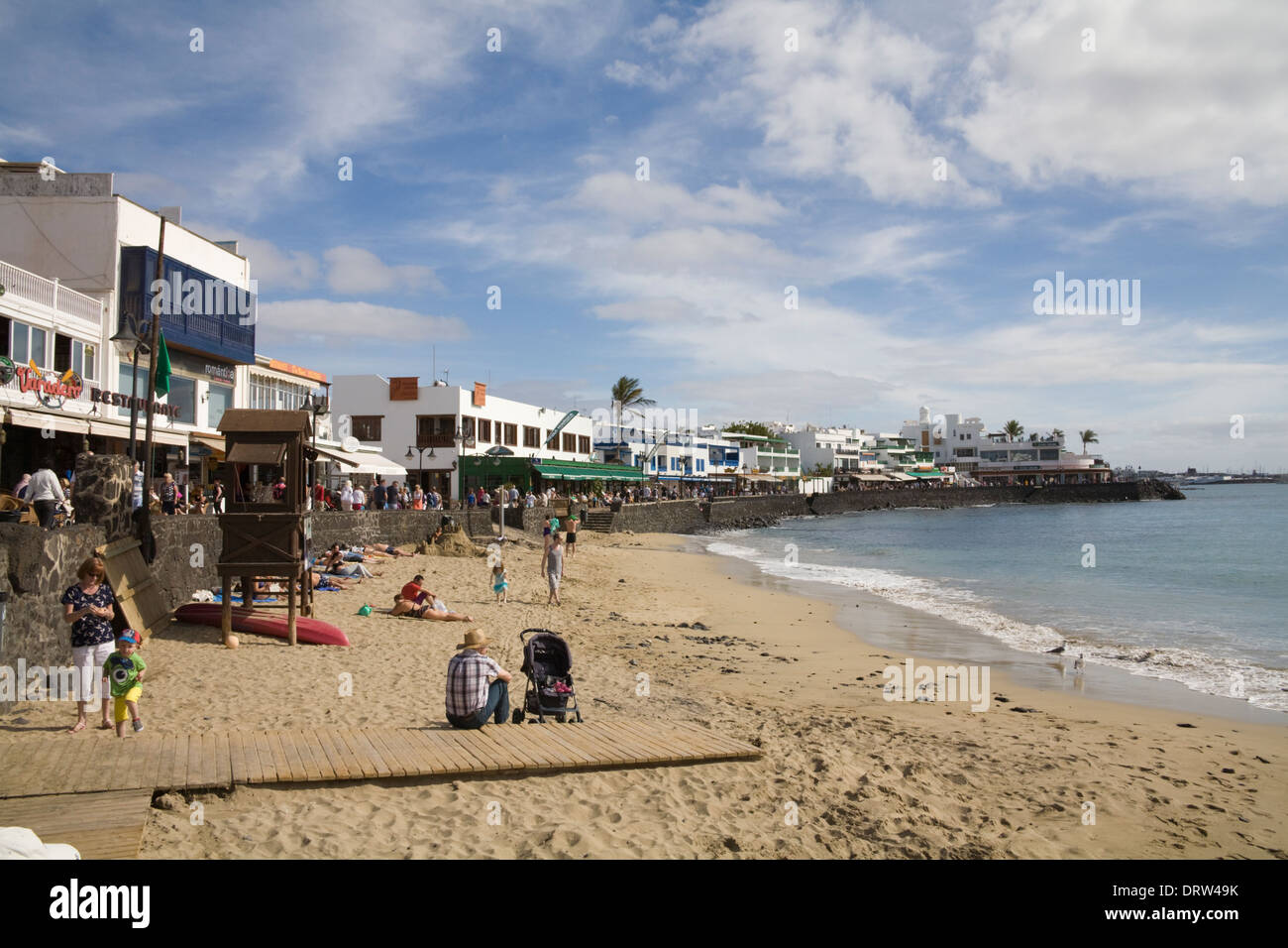 Playa Blanca Lanzarote Tourist On Sandy Beach And Waterfront