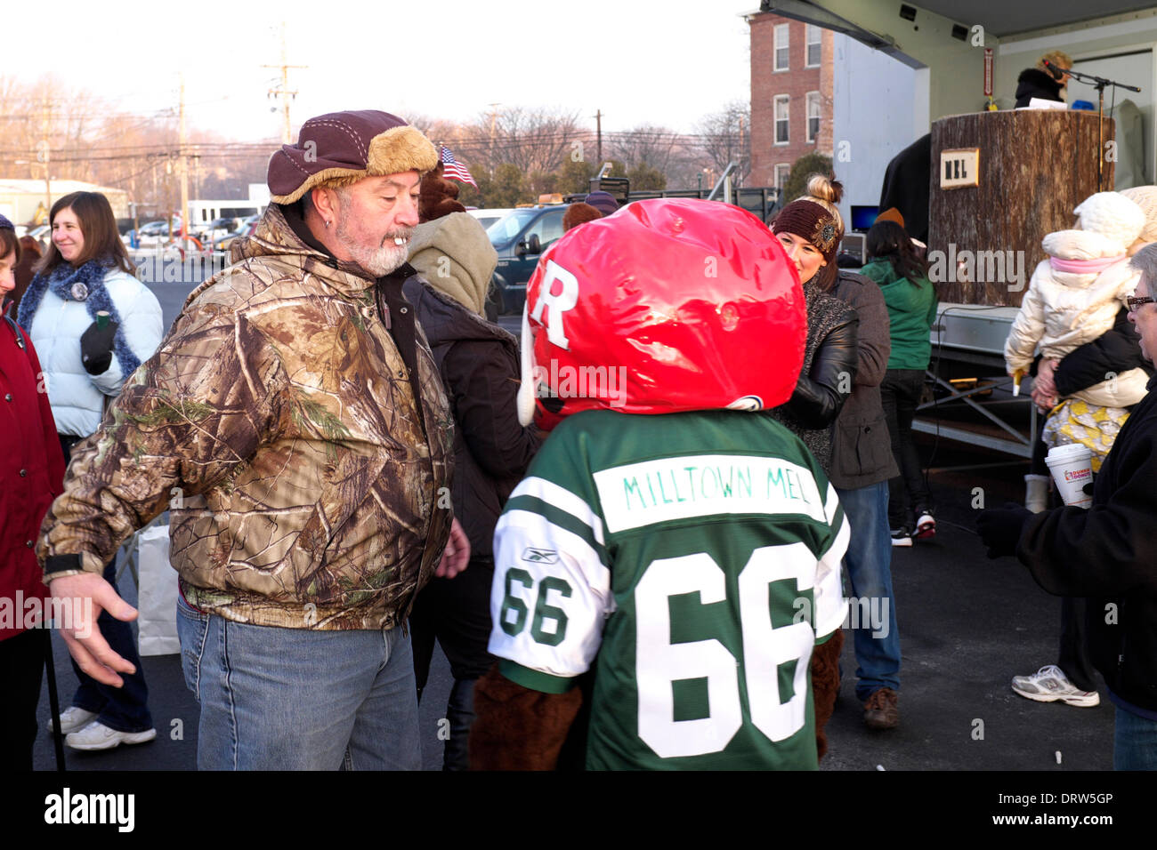 Man wearing groundhog teeth and Milltown Mel mascot at Groundhog day